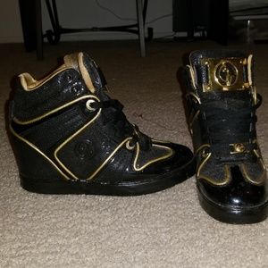 Partially worn high heeled sneakers